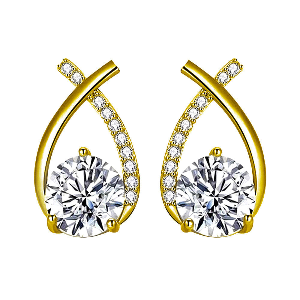 Damen-Ohrringe Arielle™ von Rose & Oliver mit elegantem Gold-Design, raffinierte Details sind auf dem Bild sichtbar.
