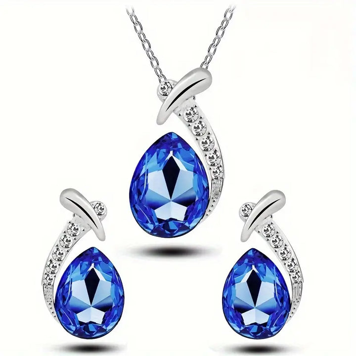 Schmuckset Klassische Meerjungfrauen-Eleganz in Weißgold, bestehend aus Halskette und Ohrringen, von der Marke Rose & Oliver.