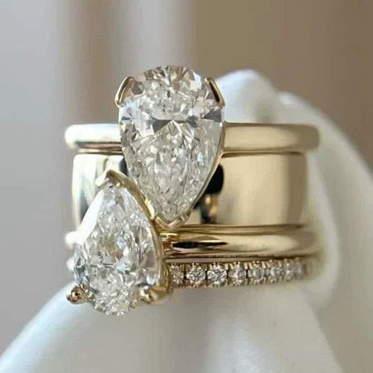 Anel vintage Rose & Oliver com gota dupla de zircônia, detalhes elegantes e acabamento clássico em prata.