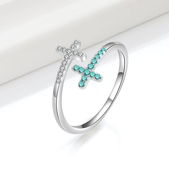 Anel duplo cruzado em turquesa e prata ajustável da Rose & Oliver, com detalhes elegantes e acabamento refinado.