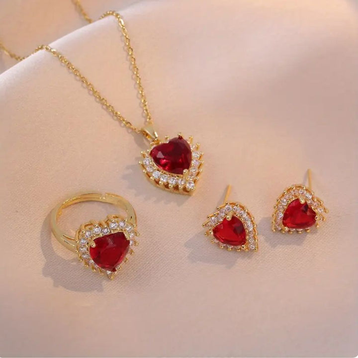 Schmuckset Anavelle Roubella mit Ring und Ohrringen in Rosa und Gold, mit eleganten Details und edler Verarbeitung.